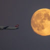 SWISS (HB-IOL) passing the moon shortly after take-off from Copenhagen to Zurich in an Airbus A321 on route LX1273
